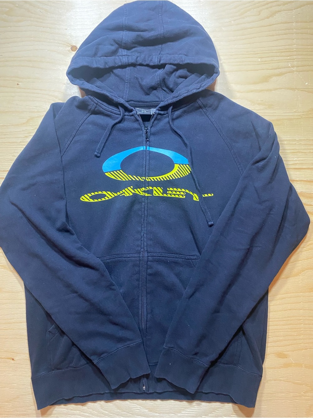 Oakley Men’s black Zip-Up Hoodie with Blue & Yellow Logo